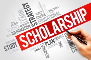 Sign with Scholarship in red.
